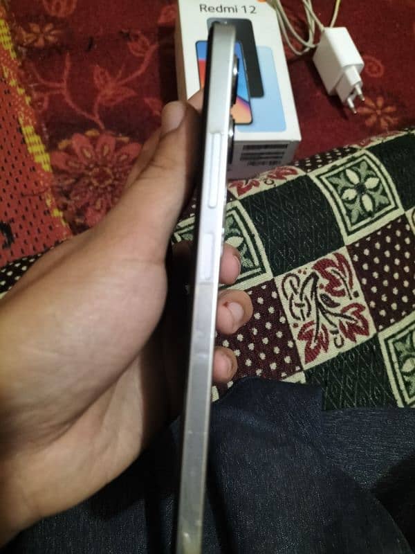 Redmi 12 full box 10by10 condition 6 128 5month warnty 3