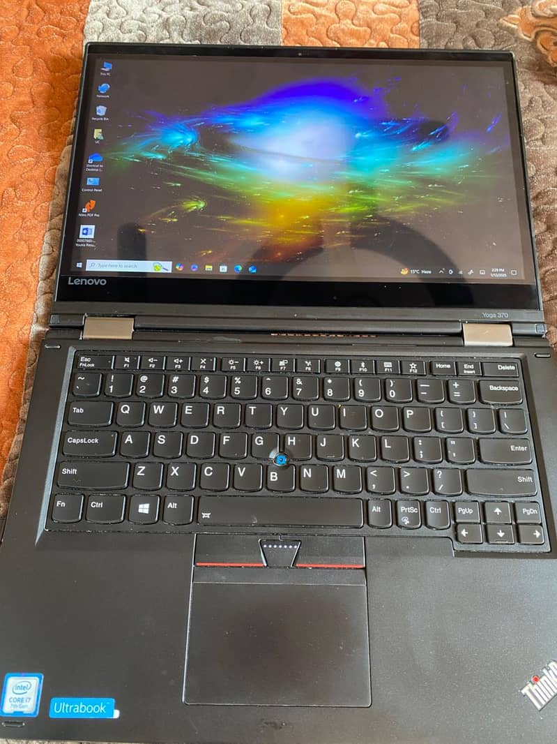 Lenovo Yoga x370 core i7 7th generation.  8 GB ram 512 GB SSD. touch 1