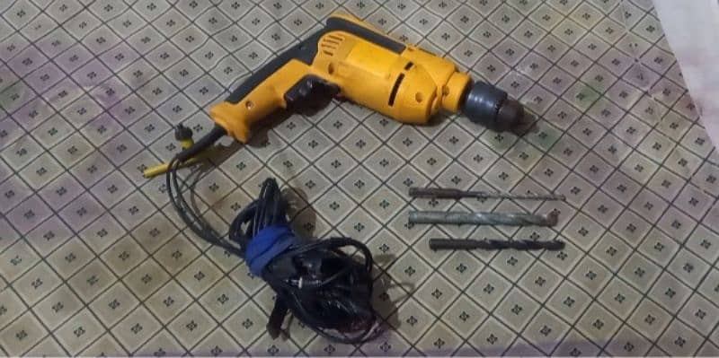 Heavy duty drill machine for sale in New condition with accessories. 0