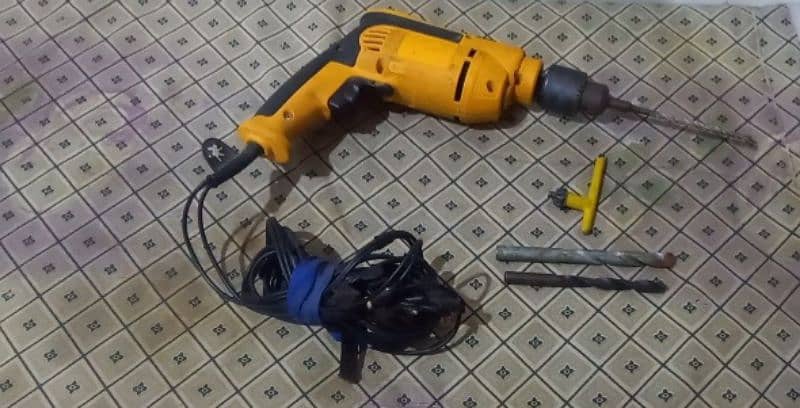 Heavy duty drill machine for sale in New condition with accessories. 2