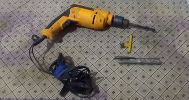 Heavy duty drill machine for sale in New condition with accessories. 3