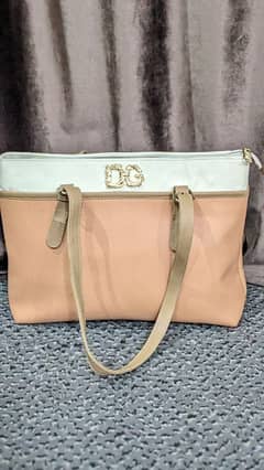 spacious cream and peach shoulder bag