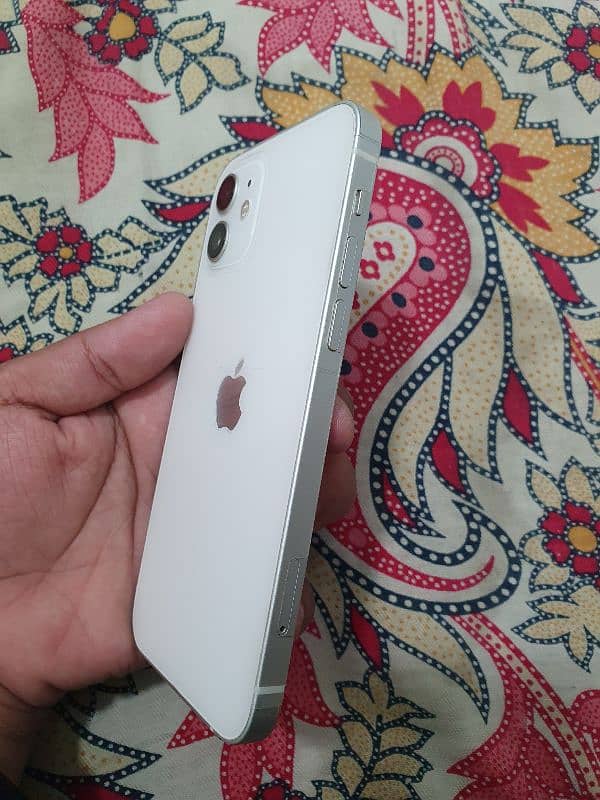 IPHONE 12 64 GB jv 81 health White color ¹ 5