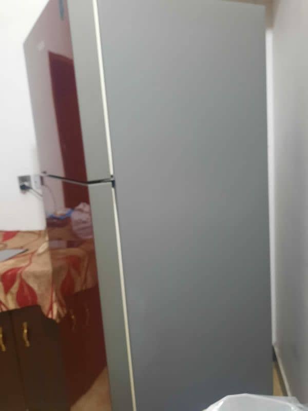 Haier company frige medium size 3