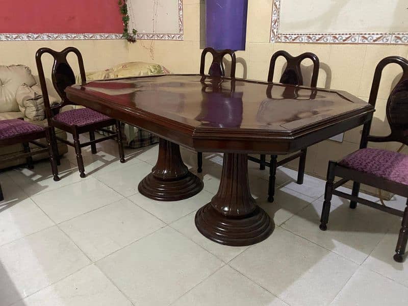 8 seater dining table in new condition with wood top 6