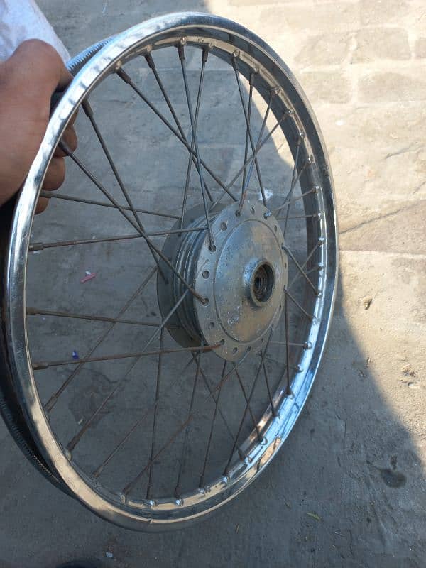 honda 70 wheel set with hub  good contion 1