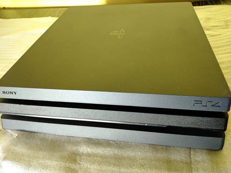 ps4 pro 1 tb with box 2 orignal controller 3 games 2