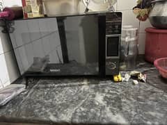 Microwave oven- cooks in wide variety of range- bake cake cupcakes an