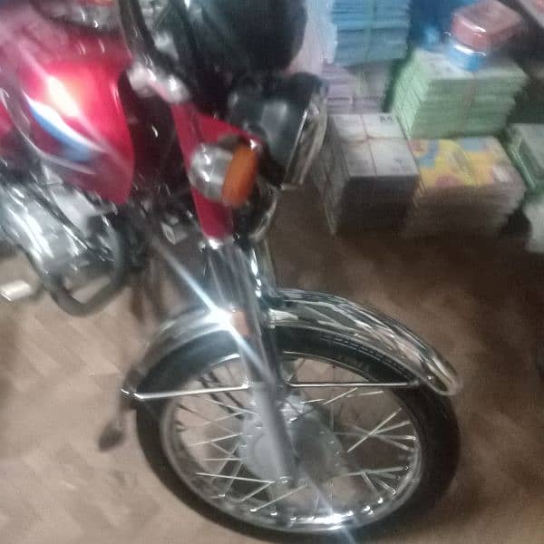 Honda 125 Karachi number excellent and zero meter condition 5