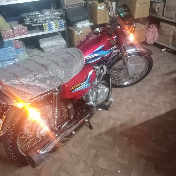 Honda 125 Karachi number excellent and zero meter condition 6