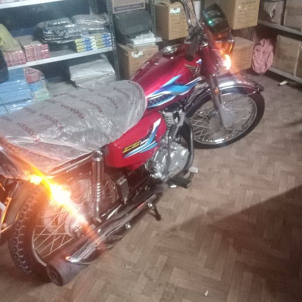 Honda 125 Karachi number excellent and zero meter condition 7