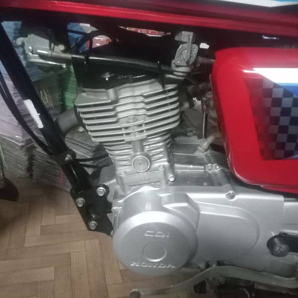 Honda 125 Karachi number excellent and zero meter condition 8