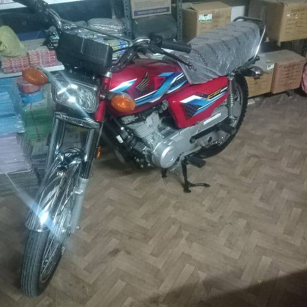 Honda 125 Karachi number excellent and zero meter condition 9