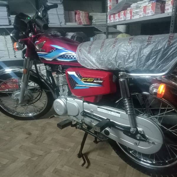 Honda 125 Karachi number excellent and zero meter condition 10