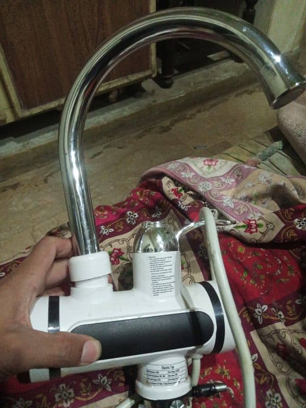 instant electric heating water . . . 5 hazar ka Lia tha 1