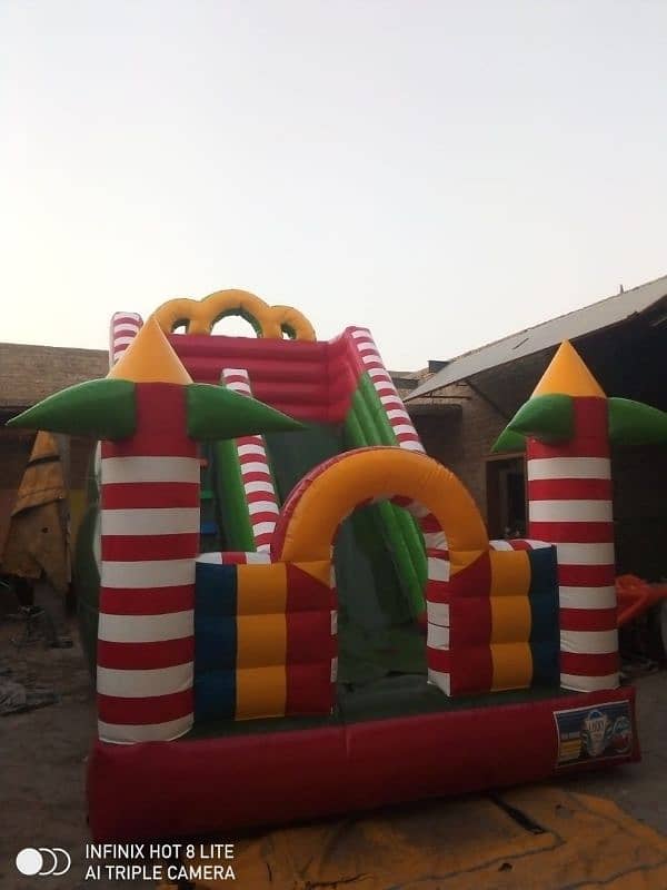 jumping castle / token rides/ kiddi rides  / jhuly / swings 5