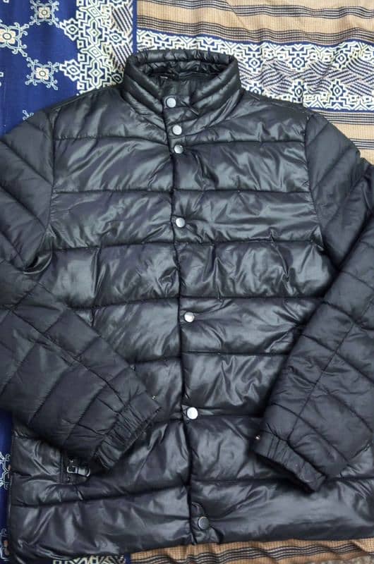 black puffer jacket . . 0