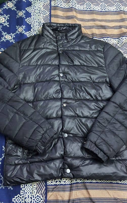 black puffer jacket . . 1