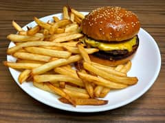 A boy for fries and burger stall   . . . .