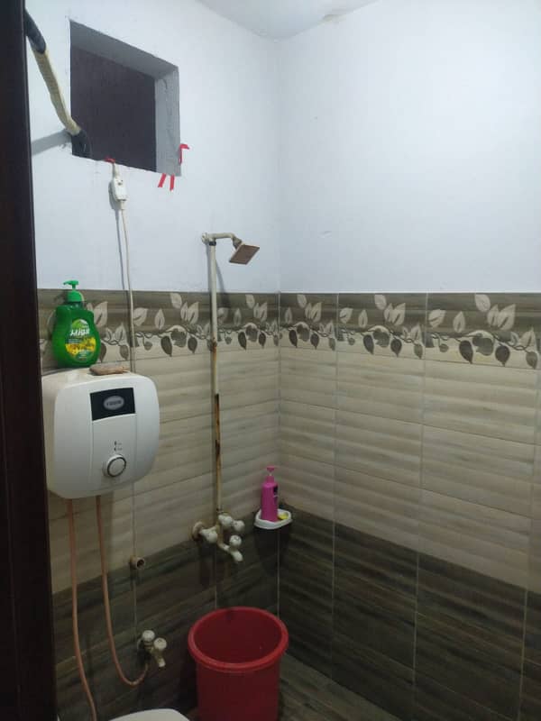 three bed dd portion with roof for rent in johar 1