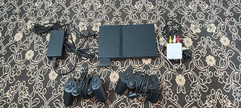 PS2 for sale with complete accessories 0