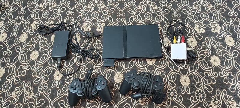 PS2 for sale with complete accessories 1