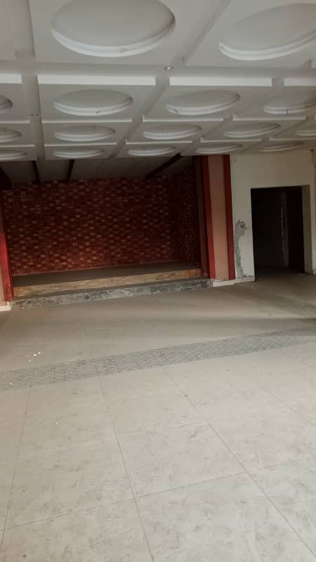 Shop Hall for rent in faisal town for Big brand restaurant Butt tika Karahi and cafe on main road very hot location on the spot point 3