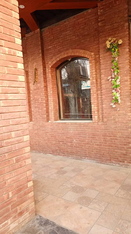 Shop Hall for rent in faisal town for Big brand restaurant Butt tika Karahi and cafe on main road very hot location on the spot point 9