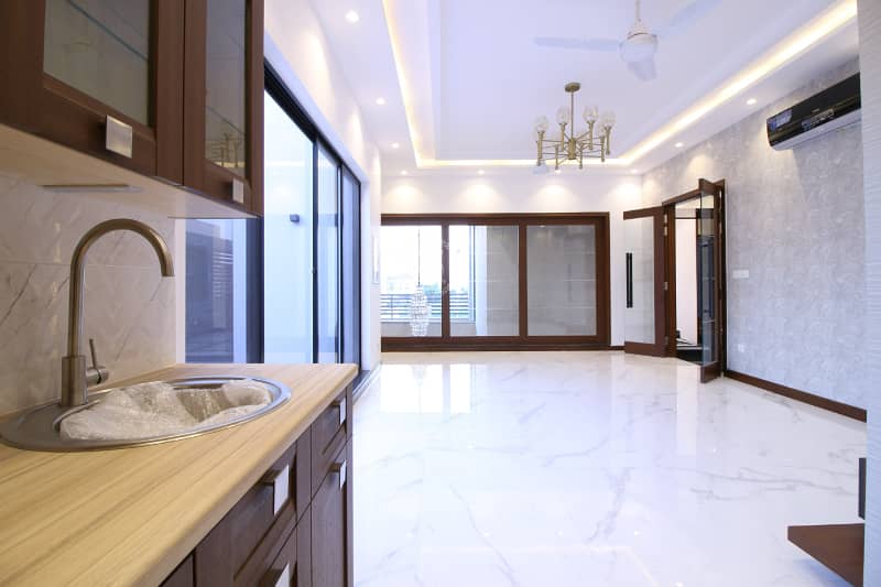 10 MARLA SLIGHTLY USED LUXURY MODERN DESIGN HOUSE FOR RENT IN DHA PHASE 6 TOP LOCATION 25