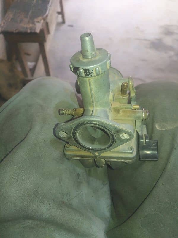 I have carburetor honda 125 in chaines maker 1