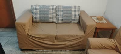 2 seater sofa (2.5ft 10inch x 5ft 3inch). Cover included. Good qlty.