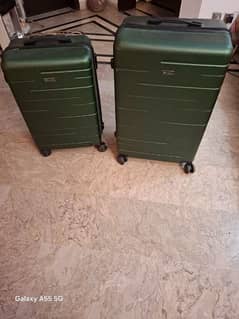 2 Luggage Bags of Fibreglass good quality, 360° Wheels