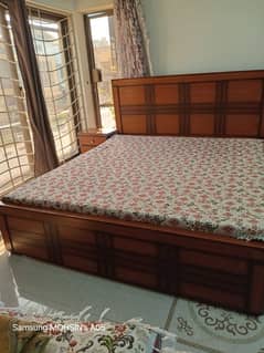 Good condition Double Bed with side Tables along with new mattress