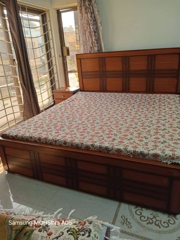 Good condition Double Bed with side Tables along with new mattress 17