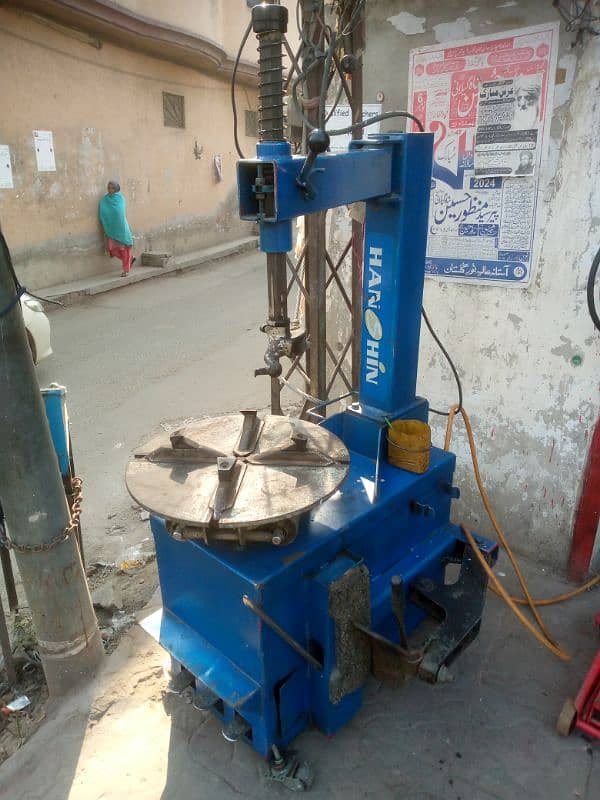 car tyre opening machine+ air camparssar 1