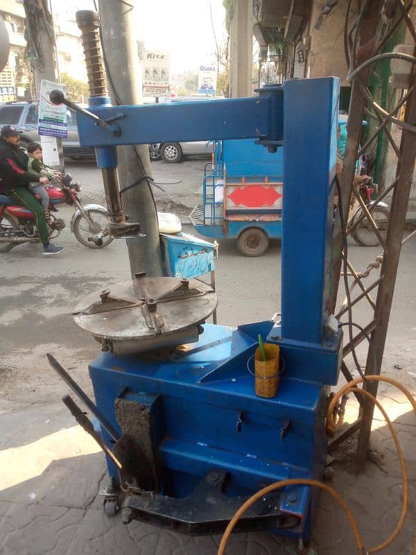 car tyre opening machine+ air camparssar 2