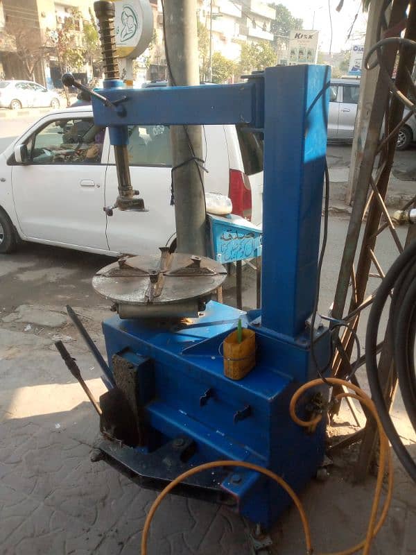 car tyre opening machine+ air camparssar 3