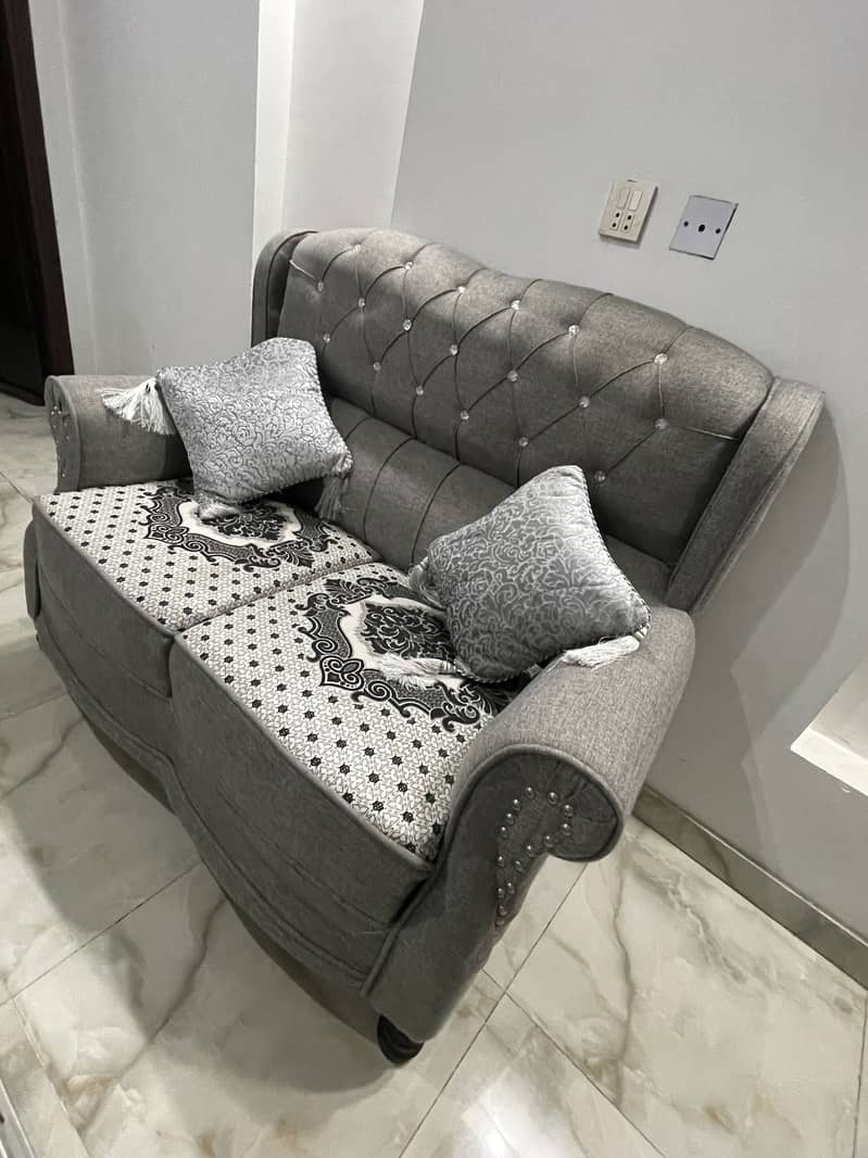 2 seater 4 peices sofa 1