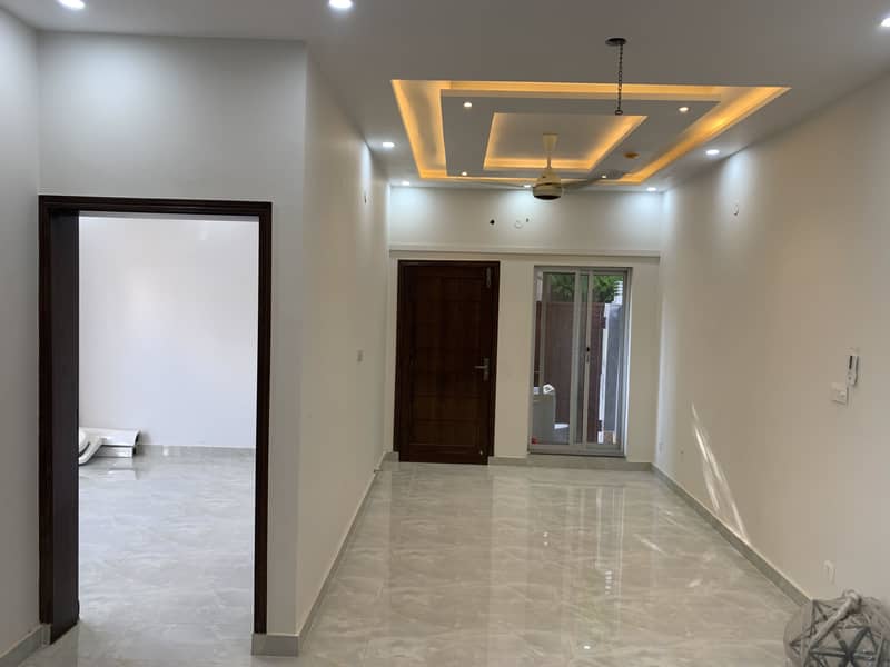 5 MARLA CORNER ON 50 FEET WIDE ROAD BRAND NEW HOUSE IS AVAILABLE FOR SALE 12