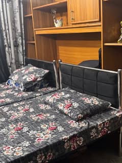 2 single beds with mattress