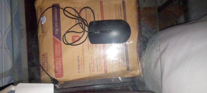 A mouse , headphones and mousepad (  old and used ) 1