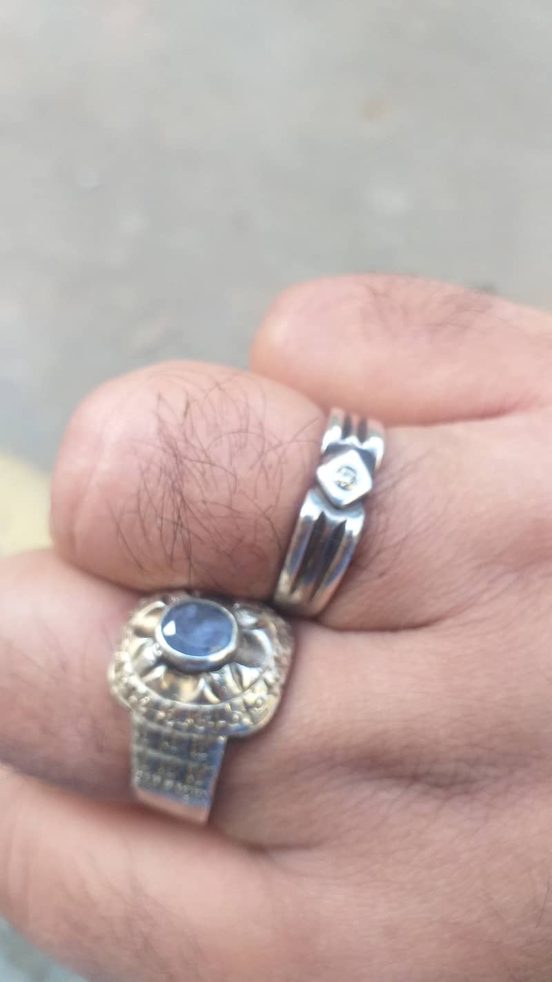 Silver diamond and sirlankan neelam rings 0