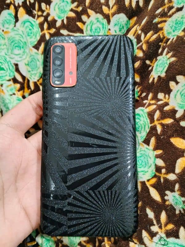 REDMI 9T 4+2.128. 6000mah battery.  0*3*0*8*9*7*2*08*2*7 7