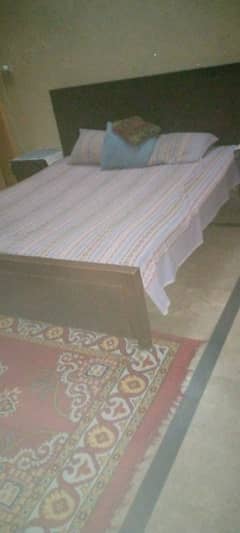 double wooden bed