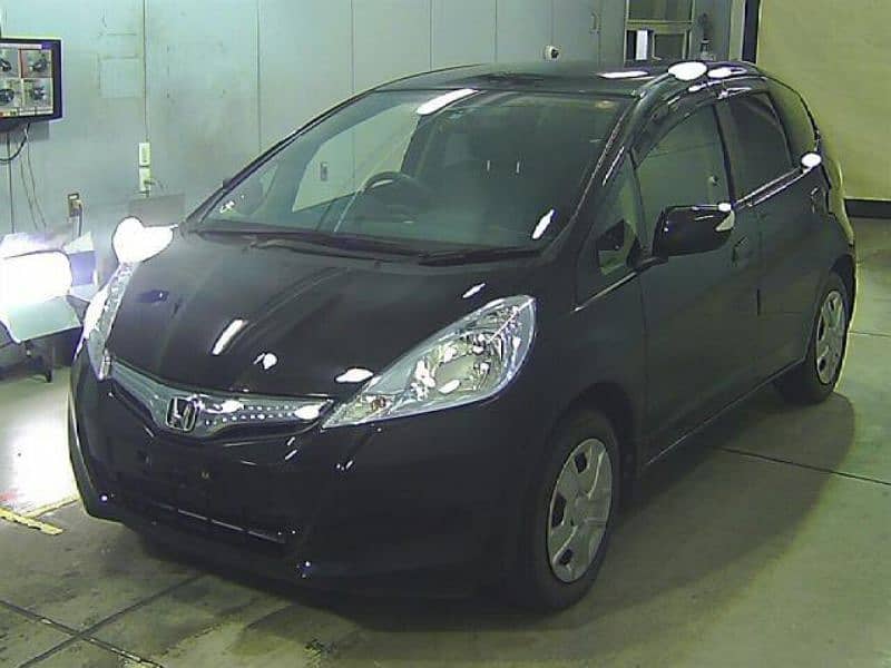 Honda Fit hybrid 11 /15, total genuine, like brand new car 19