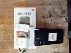 Redmi 12 8 128 gb Dabaa Charg Sat ha