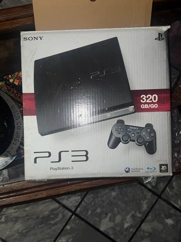 Playstation 3 slim with 17 games and box 0