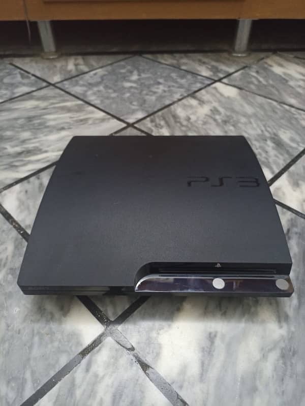 Playstation 3 slim with 17 games and box 1