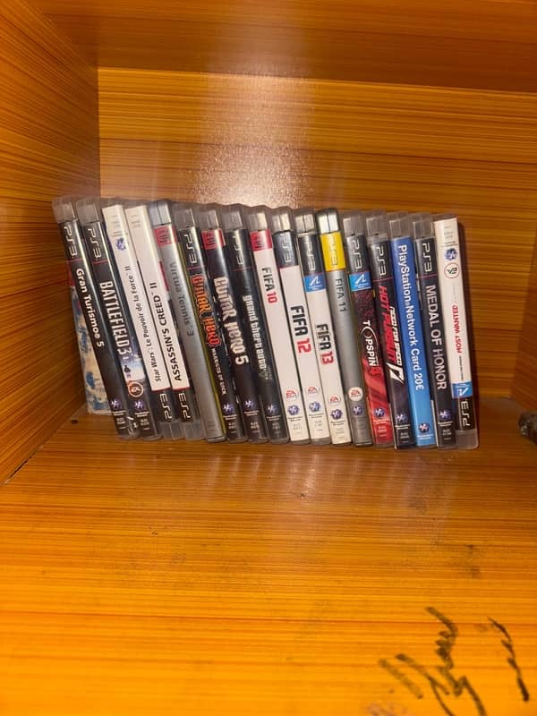 Playstation 3 slim with 17 games and box 4