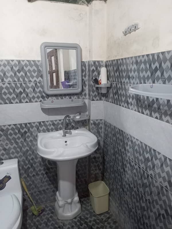 Lower portion with tile floor available for rent in allama iqbal town lahore 5